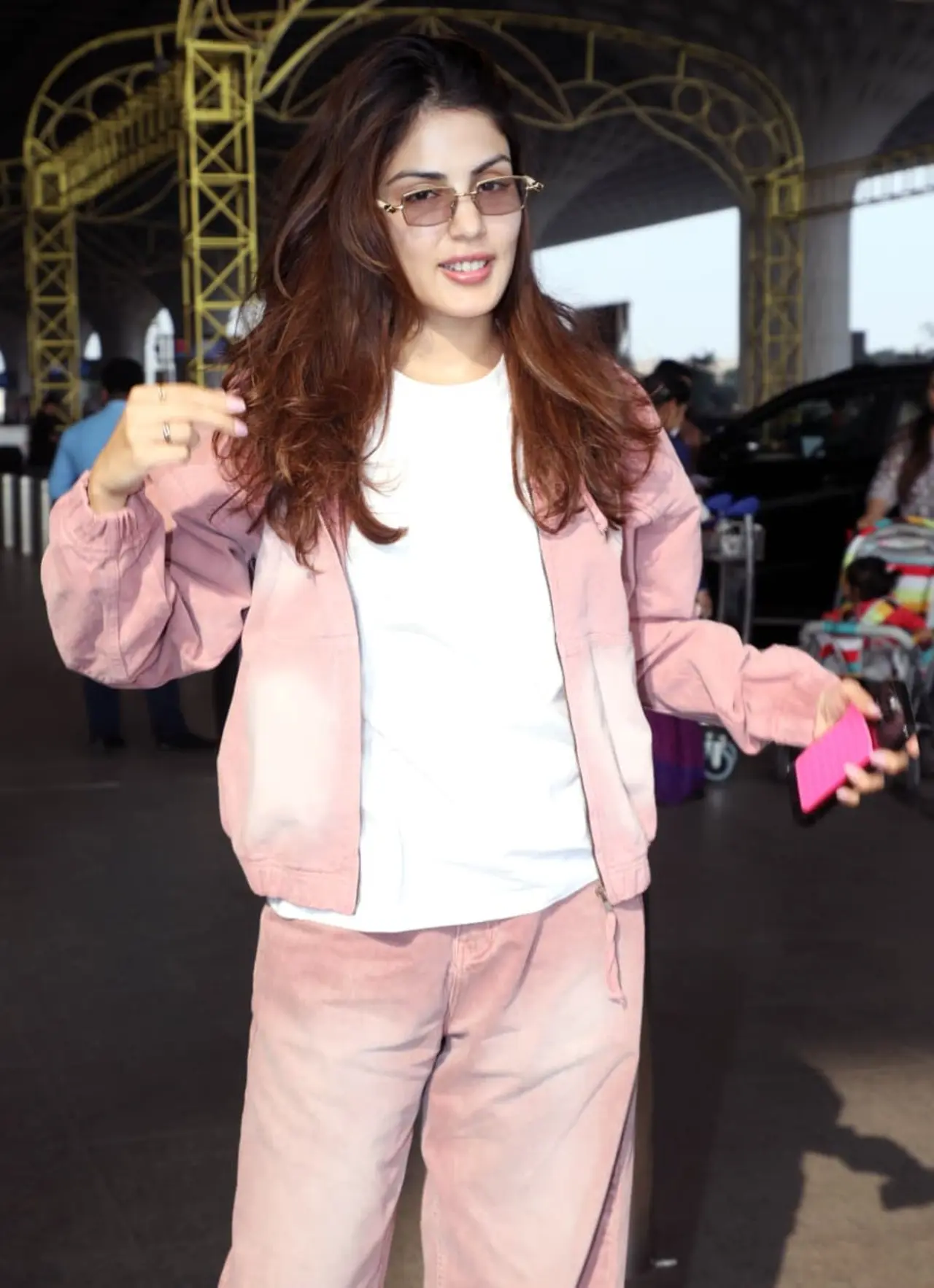 Rhea Chakraborty was seen at the airport on Tuesday morning as she headed out of the city.